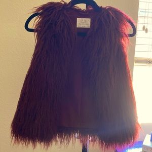 Red fluffy vest
